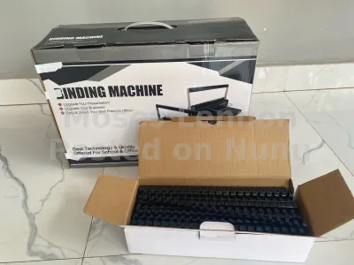 binding machine. with one box combs